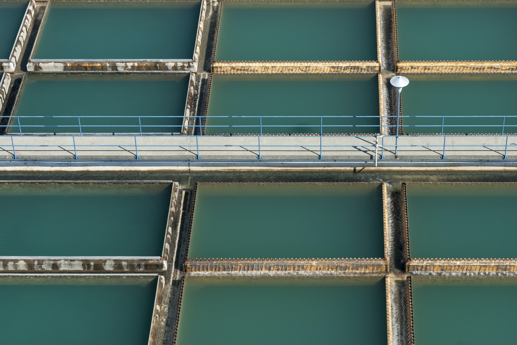 Aerial view of walkway over water treatment tanks